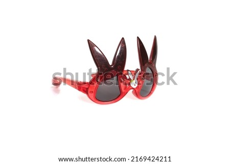 Funny extravagant party goggles on a white background. High quality photo