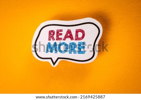 Read More. Speech bubble with text on a yellow background.