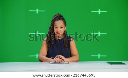 Newsroom TV Studio Live News Program with Green Screen Background: Female Presenter Reporting, Talking. Television Cable Channel Anchorwoman. Network Broadcast Mock-up with Tracking Markers