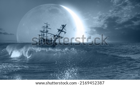 Sailing old ship in a storm sea with  crescent moon 