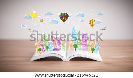 Colorful cityscape drawing on open book