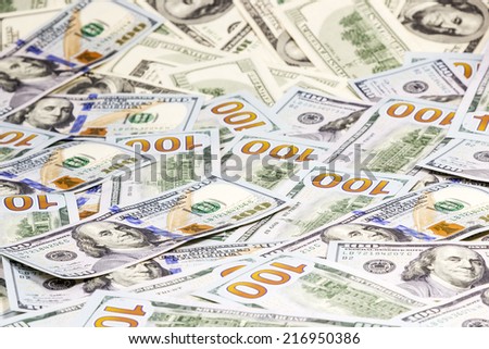 Hundred-dollar bills of the old and the new pattern as seamless background