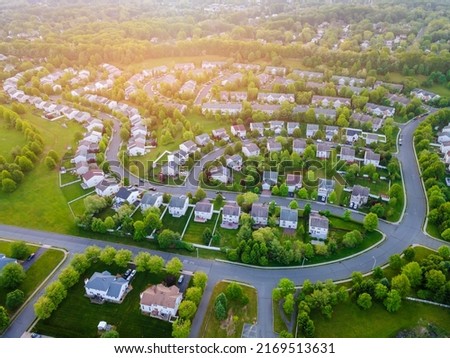 Aerial panorama view of a small town city home roofs at suburban residential quarters an New Jersey USA Royalty-Free Stock Photo #2169513631