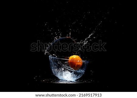Splash Orange Stop Motion Water Bowl Falling