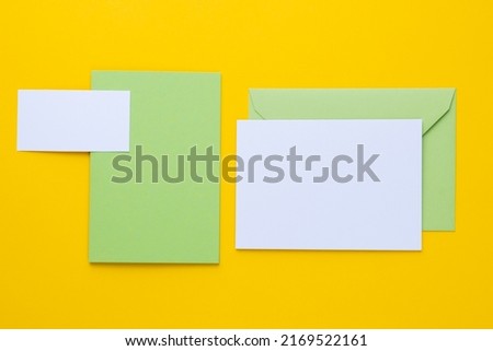 Set of branding elements on yellow background. Mock up for graphic designers presentations or business portfolios.
