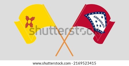 Crossed and waving flags of the State of New Mexico and The State of Arkansas. Vector illustration
