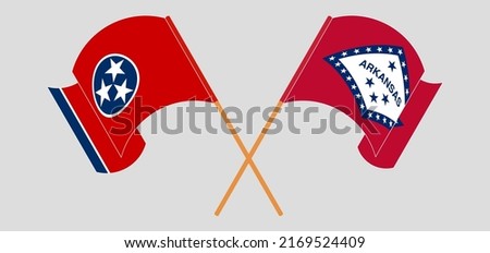 Crossed and waving flags of The State of Tennessee and The State of Arkansas. Vector illustration
