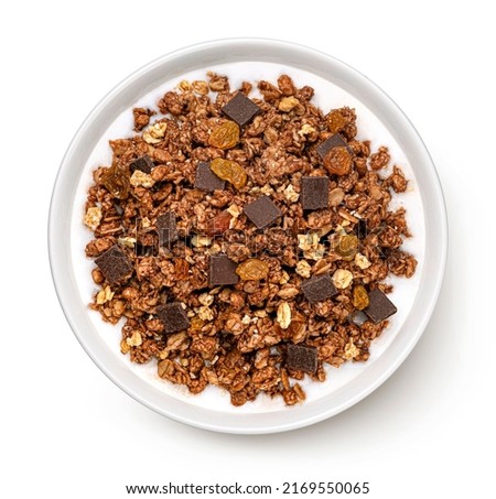 Chocolate granola with milk isolated on white background Royalty-Free Stock Photo #2169550065