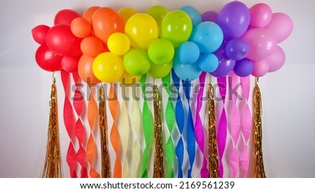 Birthday party decoration in rainbow colors. colorful backdrop balloon decor for parties and events Royalty-Free Stock Photo #2169561239