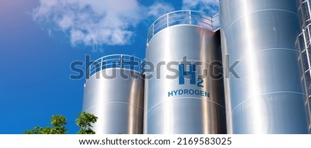 Hydrogen renewable energy production - hydrogen gas for clean electricity solar and windturbine facility.  Royalty-Free Stock Photo #2169583025