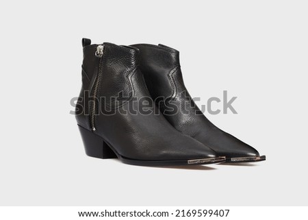 Blank black women's fashion cossack Cowboy boots isolated on white background. Female classic spring autumn shoes with Pointy Toe, heel, zipper. Leather casual footwear. Mock up, template Royalty-Free Stock Photo #2169599407