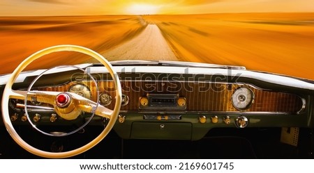 Vintage car dashboard  in the sunlight. Road, voyage and retro car concept. Royalty-Free Stock Photo #2169601745