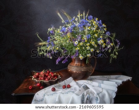Still life with wildflowers and cherry