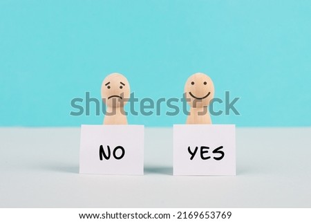 Men holding signs with the words yes and no, communication between people, business and education concept, minimalism, asking questions, looking for an answer Royalty-Free Stock Photo #2169653769