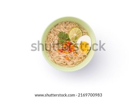 Noodles with condiment in green bowl isolated on white background , top view , flat lay.