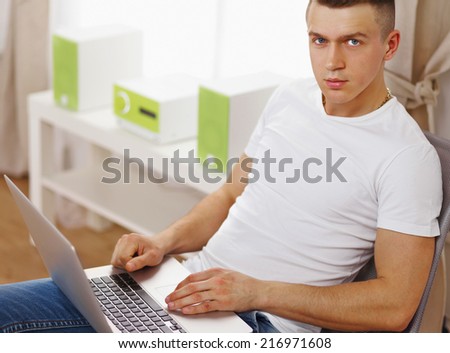 young man relaxing at home