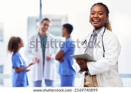 She was made for the medical field. Shot of a young female doctor using a digital tablet at work. Royalty-Free Stock Photo #2169740899