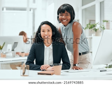 Shes going to go far in this industry. Cropped portrait of an attractive young female call center agent and her supervisor working in the office.