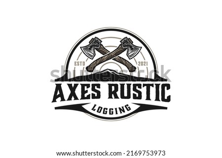 Axes rustic wood work logging logo axe design carpenter badge emblem style  Royalty-Free Stock Photo #2169753973