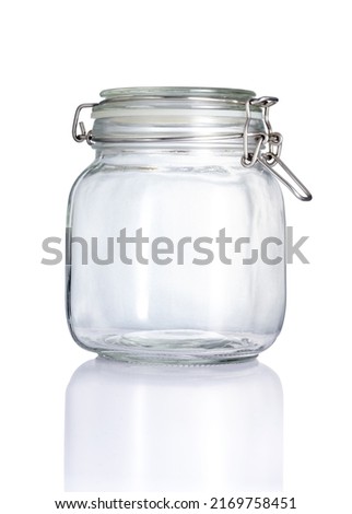 Empty clear glass jar in front view, and reflection isolated on white background, Suitable for Mock up creative graphic design, clipping path. Royalty-Free Stock Photo #2169758451