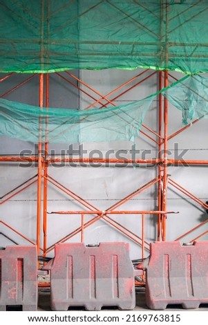 Green shading Net was used for temporary wall around construction site.Green Shading Net and green metal sheet fence prevents dust from construction site.