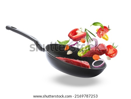 Tasty fresh ingredients and frying pan on white background Royalty-Free Stock Photo #2169787253
