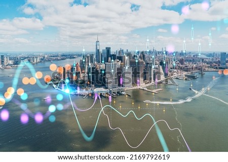 Aerial panoramic helicopter city view on Lower Manhattan district and financial Downtown, New York, USA. Forex graph hologram. The concept of internet trading, brokerage and fundamental analysis