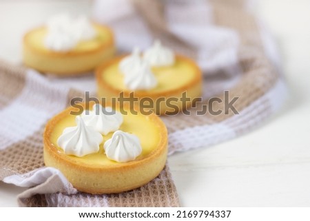 Lemon tartlets. Mini tarts with lemon curd. Baking background, pastry background 