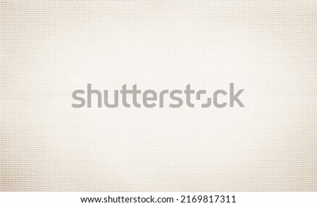 Fabric canvas woven texture background in pattern in light beige cream brown color blank. Natural gauze linen, carpet wool and cotton cloth textile as sack material clean empty for decoration text.