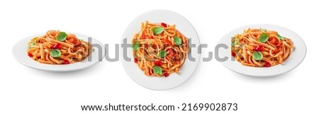 Traditional Italian linguini pasta with tomatoes and basil is isolated on a white background. A set of pasta with tomatoes in different angles. Royalty-Free Stock Photo #2169902873