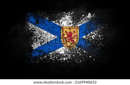 brush painted flag of Nova Scotia isolated on black background