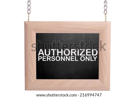 Hanging frame with "AUTHORIZED PERSONNEL ONLY" text