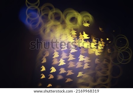 Abstract bokeh background. Golden bokeh circles on a dark blue background. Layer overlay.