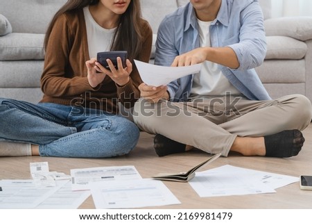 Family financial concept, Stressed wife and husband have a problem to pay loan can not pay credit card debt. Royalty-Free Stock Photo #2169981479
