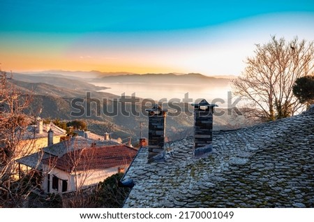 Milies Greece, Milies the  historic and the picteresque village of Pelion.  The famous train track of Moutzouris is located in short distance from the central square of village. Royalty-Free Stock Photo #2170001049