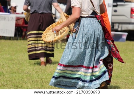 Colourful ribbons on an indigenous woman’s ribbon skirt Royalty-Free Stock Photo #2170050693