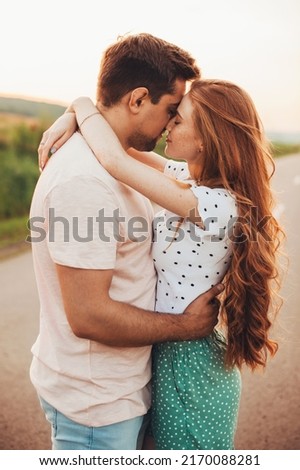 Beautiful caucasian couple in love, posing during their walk. Healthy lifestyle. Activity relationship. Royalty-Free Stock Photo #2170088281