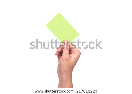 Woman's hand holding paper on white background 