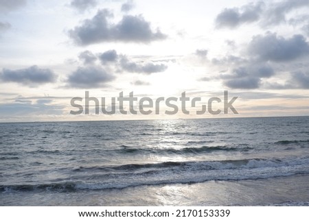 Closeup sea sand beach. Inspire tropical beach seascape horizon. Panoramic beach landscape. Orange and golden sunset sky calmness tranquil relaxing sunlight summer mood. Vacation travel holiday banner