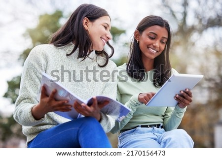 Theres nobody like a study buddy. Shot of two young women studying together at college. Royalty-Free Stock Photo #2170156473
