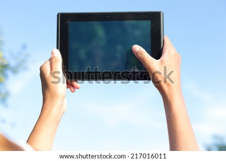 tablet pc in human hands
