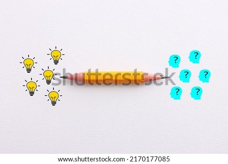 Education concept image. Creative idea and innovation. Pencil and light bulb metaphor over white paper background