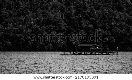 side view of lakeside living fisherman's wharf  Royalty-Free Stock Photo #2170193391