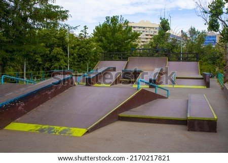 a small skate park in the city. sports near the house. ramp for extreme athletes