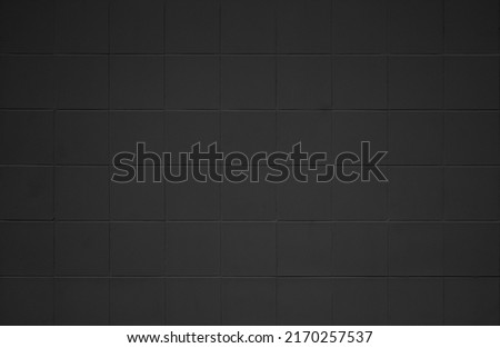 Black tile high resolution real photo. Brick seamless pattern and texture square floor ceramic tiles interior room background. Dark grid tiles wall texture for the bander decoration backdrop.