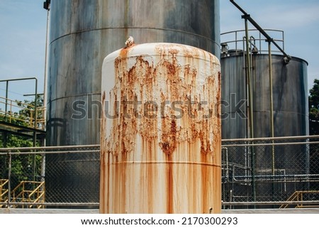 The chemical industry with fuel storage tank corrosion. Royalty-Free Stock Photo #2170300293