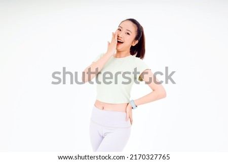 Young beautiful girl wearing yoga exercise casual clothes pointing finger up with successful idea, exited and happy expression. Finger gesture lady over isolated background