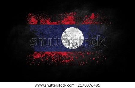 brush painted flag of Laos isolated on black background