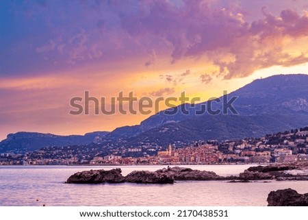  Menton, France, Provence-Alpes, Cote d'Azur. Evening panoramic view of the colorful old town at sunset in summer. Beautiful houses in the old part of the French Riviera Royalty-Free Stock Photo #2170438531