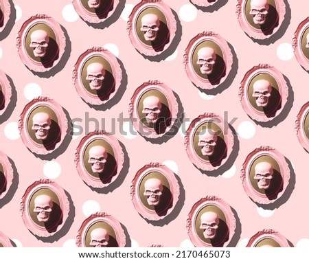 Human skull framed against pastel pink wall. Creative pattern. Gothic style.